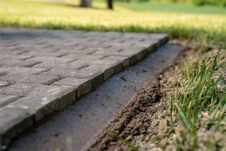 Can you put pavers next to concrete?
