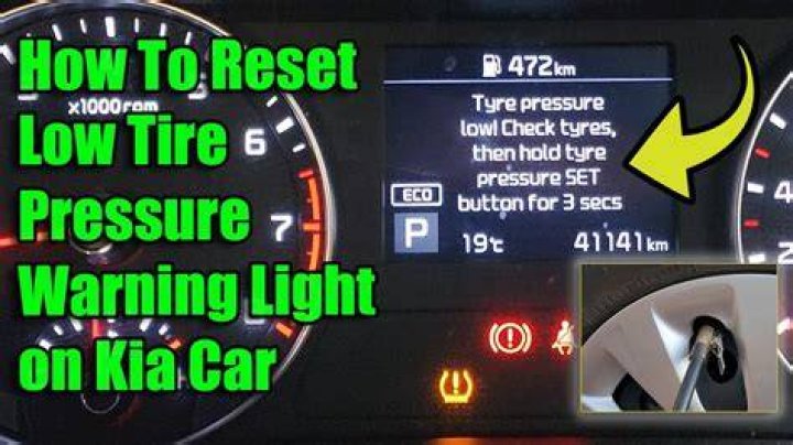 How do you reset the low tire pressure light on a Kia Forte?