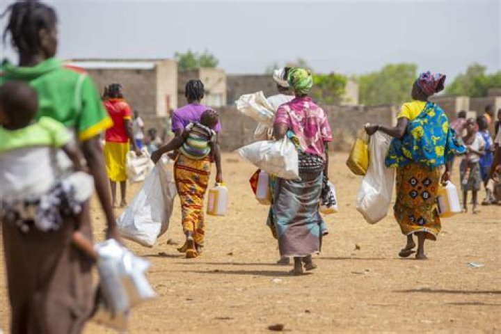 Who believed the population will grow faster than the food supply?