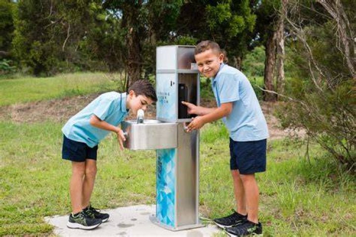 Who pays for the water fountains at school?