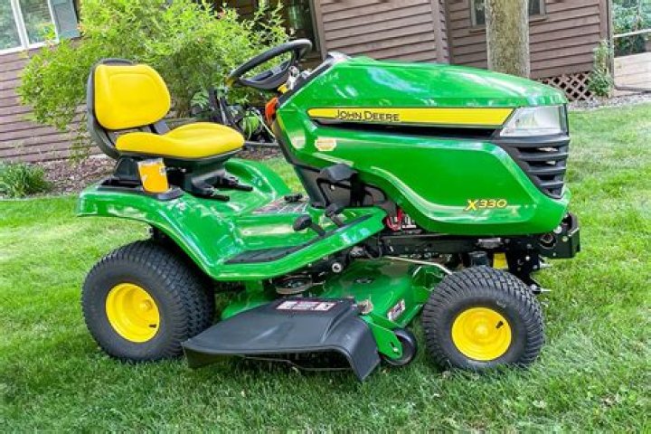 Why does my John Deere riding mower cut uneven?