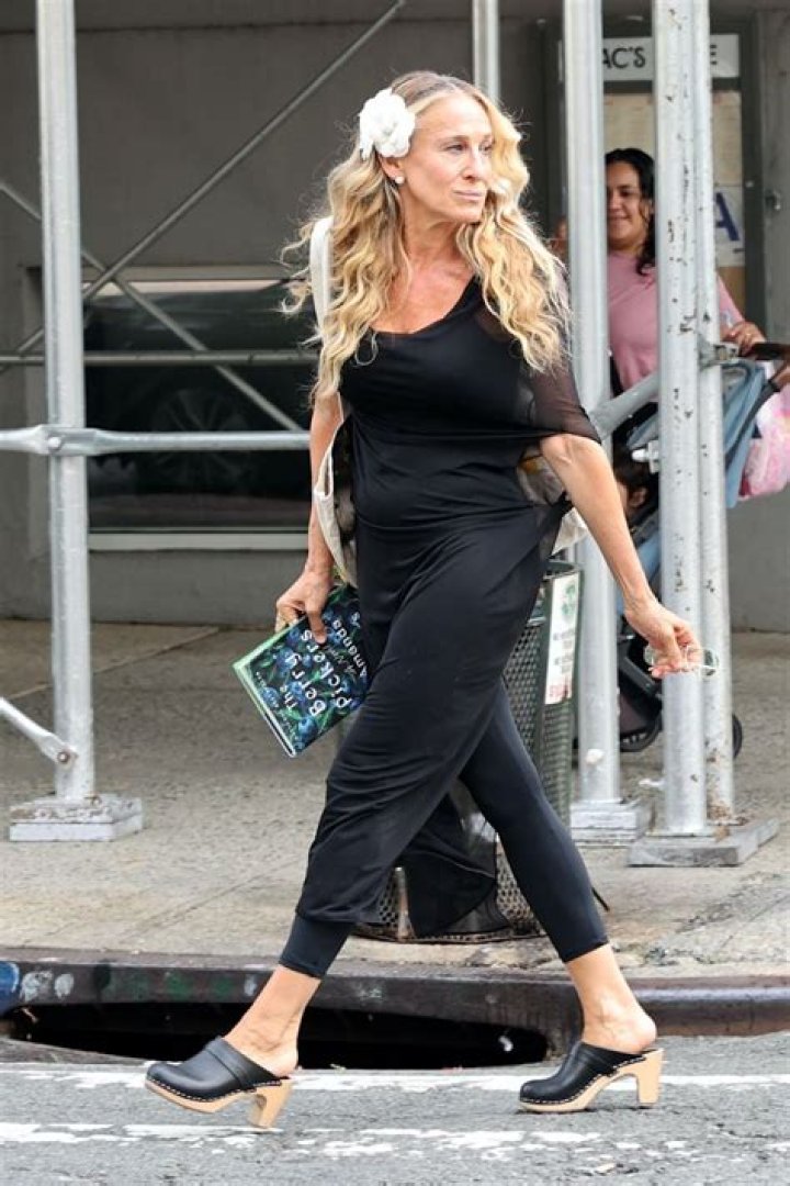 Why does SJP want to wear heels again?